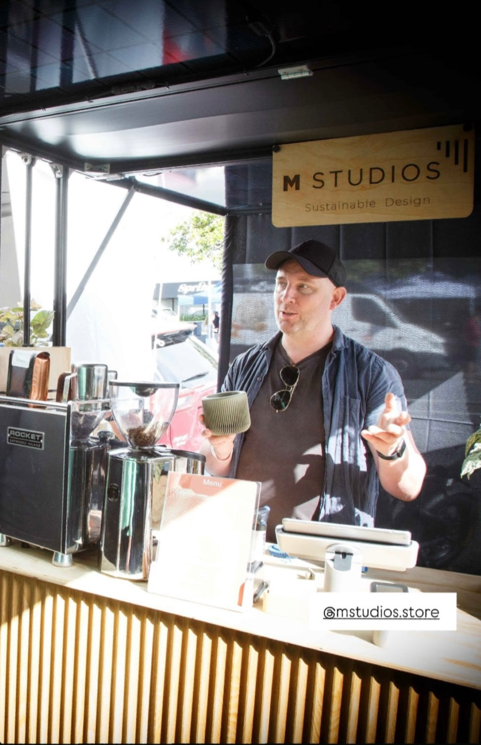 Tim explaining sustainable design at the Ponsonby Markets in our mobile design stall.